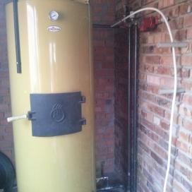 Монтаж твердотопливного котла и дымохода