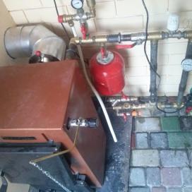 Монтаж твердотопливного котла и дымохода (Днепропетровск, ул.Юрия Савченко)