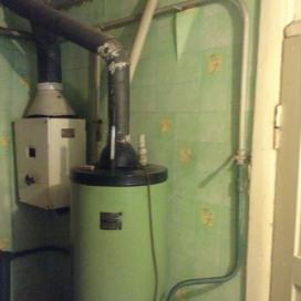 Реконструкция системы отопления частного дома (поселок Мирный), монтаж котла