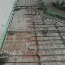 установка маяков для монтажа стяжки над теплым полом